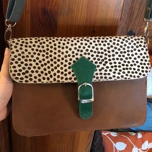 Purse! Leather! vintage looking. Great designer.